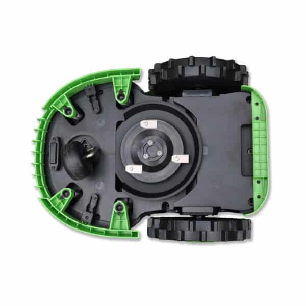 Bottom view of a green Buddy the Robot Lawn Mower with exposed cutting blade and wheels. The housing is primarily green with some black components, including the wheels and the central blade mechanism.