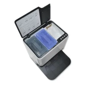 Image showing an open Glider Robot Vacuum and Mop docking and charging unit with 3 compartments.