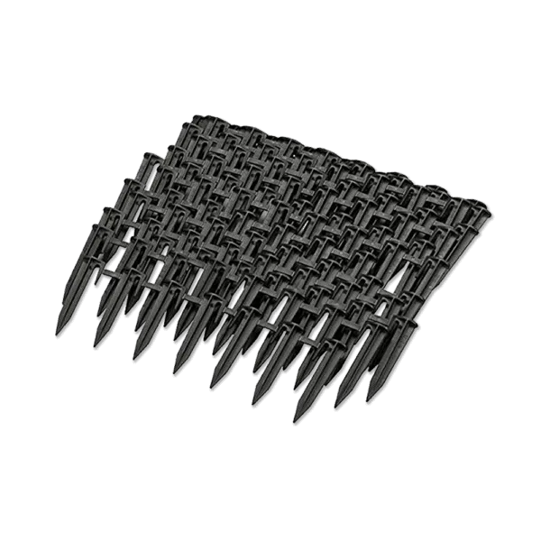A set of black pegs for boundary wire installation.