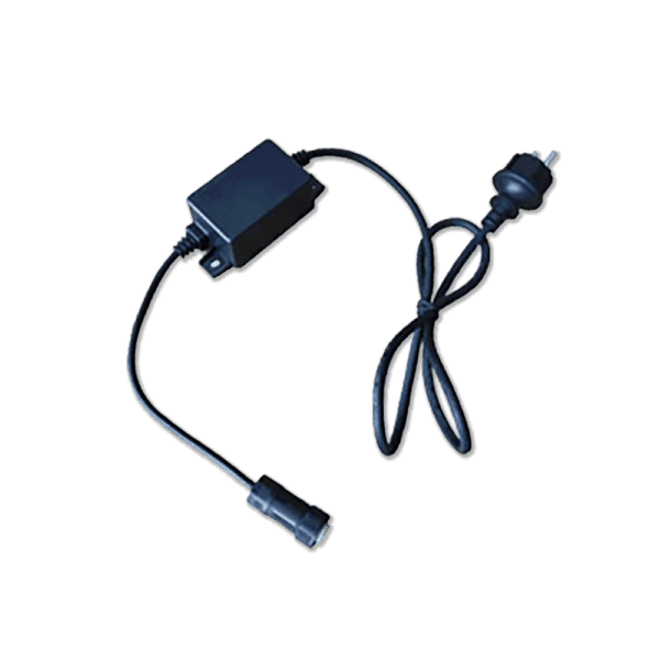 Image of a black electrical plug adapter with a power cord. The Power Lead has a rectangular black box in the middle and an extension cable with two different connectors at each end; one end has a European-style plug, and the other has a round connector.